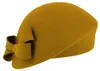 Fiebig schicker asymmetrischer Pillbox-Filzhut mit Schleife in gelb
