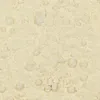 A close-up, top-down view of a pile of fine, pale yellow powder, likely coconut flour, with small clumps and variations in texture. Podgląd zdjęcia produktu
