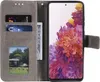 A flip case for a Samsung Galaxy S20 FE phone, showing the inside with card slots and a picture, and the phone screen displaying a colorful floral image. Produktbild-Vorschau