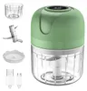 A product shot of a mini electric food chopper and its accessories against a white background. Produktbild-Vorschau