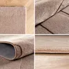 A collage of four close-up images showing the texture and details of a beige rug. Produktbild-Vorschau