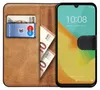 A brown leather flip case for a smartphone, with cards and banknotes inserted. Produktbild-Vorschau