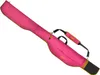 A pink rod case with yellow accents and black straps, lying diagonally on a white background. Produktbild-Vorschau