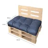 A blue cushion on a wooden pallet bench with dimensions indicated. Produktbild-Vorschau