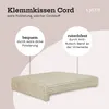 A cushion on a light background with text overlays describing its features. Náhled obrázku produktu