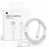 A white box with the Apple logo and product details, next to a coiled white USB-C to Lightning cable. Produktbild-Vorschau