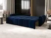 A dark blue sofa bed is shown in a modern living room setting, with decorative elements and curtains. Produktbild-Vorschau
