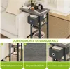 A C-shaped side table next to a sofa, with close-up views of its features. Produktbild-Vorschau