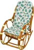 A rattan rocking chair with a cushion featuring a tropical leaf pattern, presented against a white background. Anteprima dell’immagine prodotto