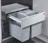 A pull-out kitchen bin system with multiple compartments, installed in a cabinet. Produktbild-Vorschau