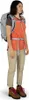 A woman wearing a backpack and hiking attire. Produktbild-Vorschau