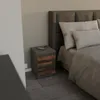A bedside table with two drawers next to a bed in a bedroom. Voir les images du produit
