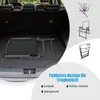 A folded camping chair is placed in the trunk of a car, with illustrative diagrams of the chair's features on the right side. Podgląd zdjęcia produktu