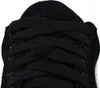 A close-up view of the laces and tongue of a black shoe. Anteprima dell’immagine prodotto