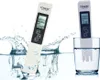 Two TDS meters, one submerged in water and another in a glass of water. Voir les images du produit
