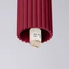 A close-up view of the bottom of a burgundy colored light fixture, showing the G9 LED bulb socket. Produktbild-Vorschau