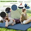 Two people are lying on camping mats in front of a tent. Náhľad obrázku produktu