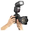 Hands holding a camera with a flash attached. Podgląd zdjęcia produktu