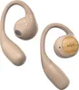 A pair of beige wireless earbuds with a wooden accent on one of the earbuds. Voir les images du produit