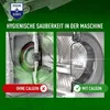 A split image showing the inside of a washing machine drum, comparing the effects of using Calgon with not using it. The left side, labeled 'OHNE CALGON' (Without Calgon), shows a dirty, limescale-covered drum with green mist representing residue. The righ Produktbild-Vorschau