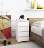 A bedroom scene with a nightstand next to a bed. Produktbild-Vorschau