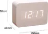 A digital alarm clock with dimensions indicated by text overlays. Produktbild-Vorschau