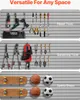 A wall-mounted storage system displaying various tools, sports equipment, and gardening supplies, organized into three distinct sections. Náhled obrázku produktu
