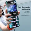A person is holding a flip phone case with a patterned design and a screen displaying a blue flower. Produktbild-Vorschau