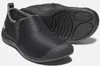 A pair of black slip-on shoes shown from a diagonal angle, with one shoe on its side showing the sole. Produktbild-Vorschau