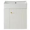 A white vanity cabinet with a fluted door and a gold knob, topped with a white sink. Voir les images du produit