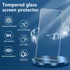 A clear glass screen protector is displayed on a stand, with hexagonal icons detailing its features. Produktbild-Vorschau
