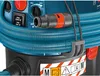 A close-up view of a blue Bosch vacuum cleaner, showing the hose attachment and control panel. Náhled obrázku produktu