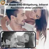 A couple is shown in a romantic embrace, with a smartphone displaying a black and white image of the same couple, suggesting the camera's night vision capabilities. Produktbild-Vorschau