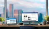 A desk setup with a laptop, external monitor, and docking station in front of a window with a city view. Produktbild-Vorschau