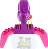 A purple and pink toy projector with colorful markers and a projected image of a train. Náhľad obrázku produktu