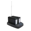 A black restaurant pager system with multiple pagers docked in a charging base, featuring an antenna. Voir les images du produit