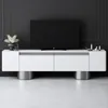 A modern white TV stand with a black television on top, set against a dark gray wall. Voir les images du produit