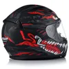 A side view of a motorcycle helmet with a monster graphic. Produktbild-Vorschau