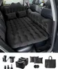 An inflatable mattress set up in the back of a car, with accessories shown below. Podgląd zdjęcia produktu