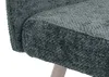 A close-up view of the textured fabric of a bench seat. Produktbild-Vorschau