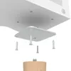 Close-up view of a furniture leg being attached to a white surface with screws and a mounting plate. Produktbild-Vorschau