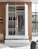 A white high-gloss wardrobe with open doors, revealing shelves and hanging clothes. The background is a textured brown wall. Produktbild-Vorschau