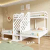 A children's bedroom with a white bunk bed featuring a slide and storage stairs. Náhled obrázku produktu
