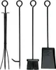 A set of black fireplace tools including a poker, brush, shovel, and tongs, arranged on a white background. Produktbild-Vorschau