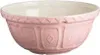 A pink ceramic mixing bowl with a textured exterior and a white interior, shown from a slightly elevated side angle. Náhled obrázku produktu