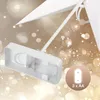 Close-up of a battery compartment for a decorative star, with a bokeh background. Produktbild-Vorschau