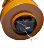 Close-up view of the bottom of a decorative lighthouse, showing the battery compartment with a switch and wiring. Produktbild-Vorschau