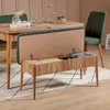 A dining table and chairs set in a room setting, with a bench open to reveal storage. Voir les images du produit