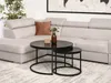 A sectional sofa in a living room with two nesting coffee tables in front of it. Podgląd zdjęcia produktu
