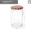 A clear studio shot of a glass jar with a red and white checkered lid. Produktbild-Vorschau